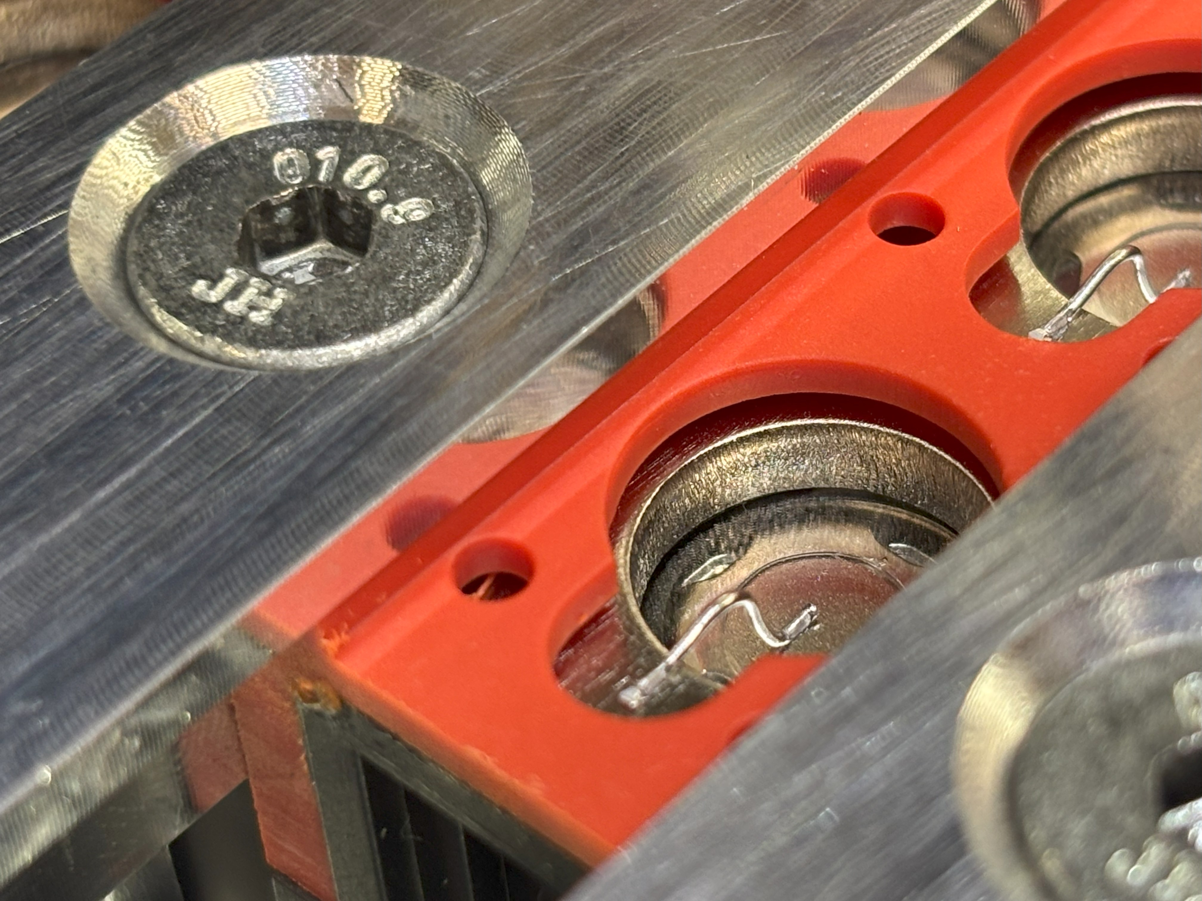 High-resolution close-up of completed wire bond showing metallurgical connection
