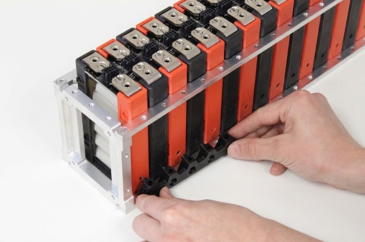 Module retainer posts being aligned with module retention holes