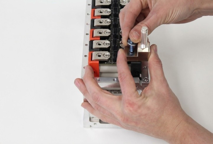 Busbar and installation hardware staged for assembly