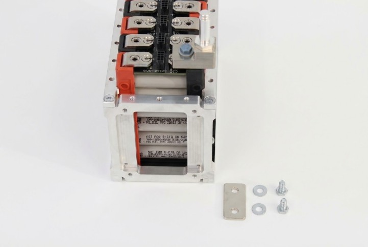 Mid-assembly showing progressive busbar installation