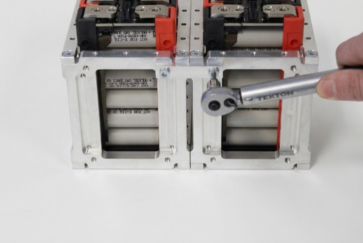 Completed mending brace installation with torque marks visible