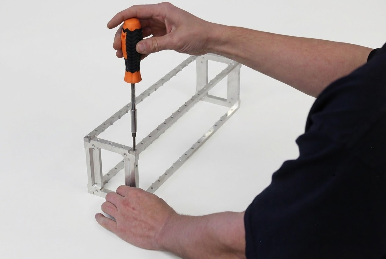 Top rails installed showing complete rectangular frame assembly