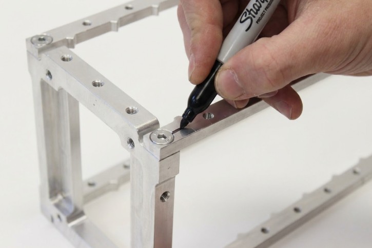 Example of proper torque marking on fasteners showing witness marks